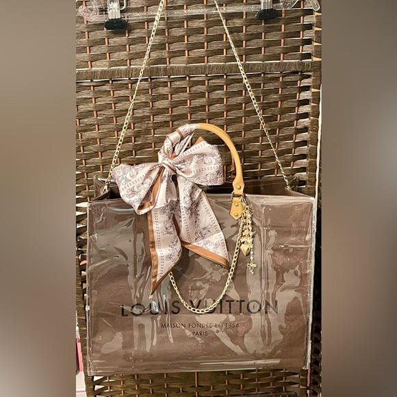 Louis Vuitton Elegant Brown Shopping Tote Bag with Scarf Accent and charms